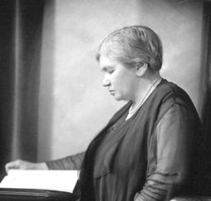Old black and white picture of a woman named Maude Abbott