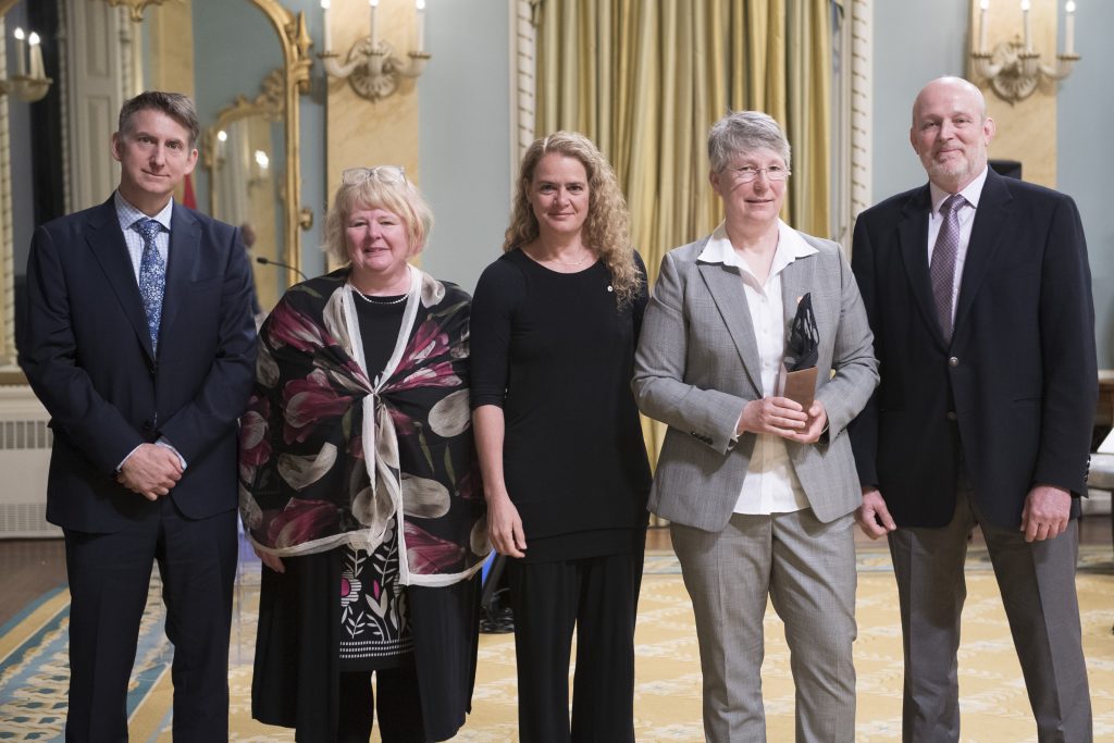 Award winners - two men, two women - posing with Governor General
