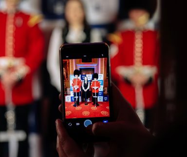 Photo of someone taking a picture with their phone