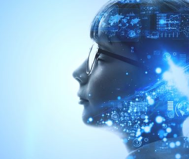 woman thinking with graphics of data systems floating around her head