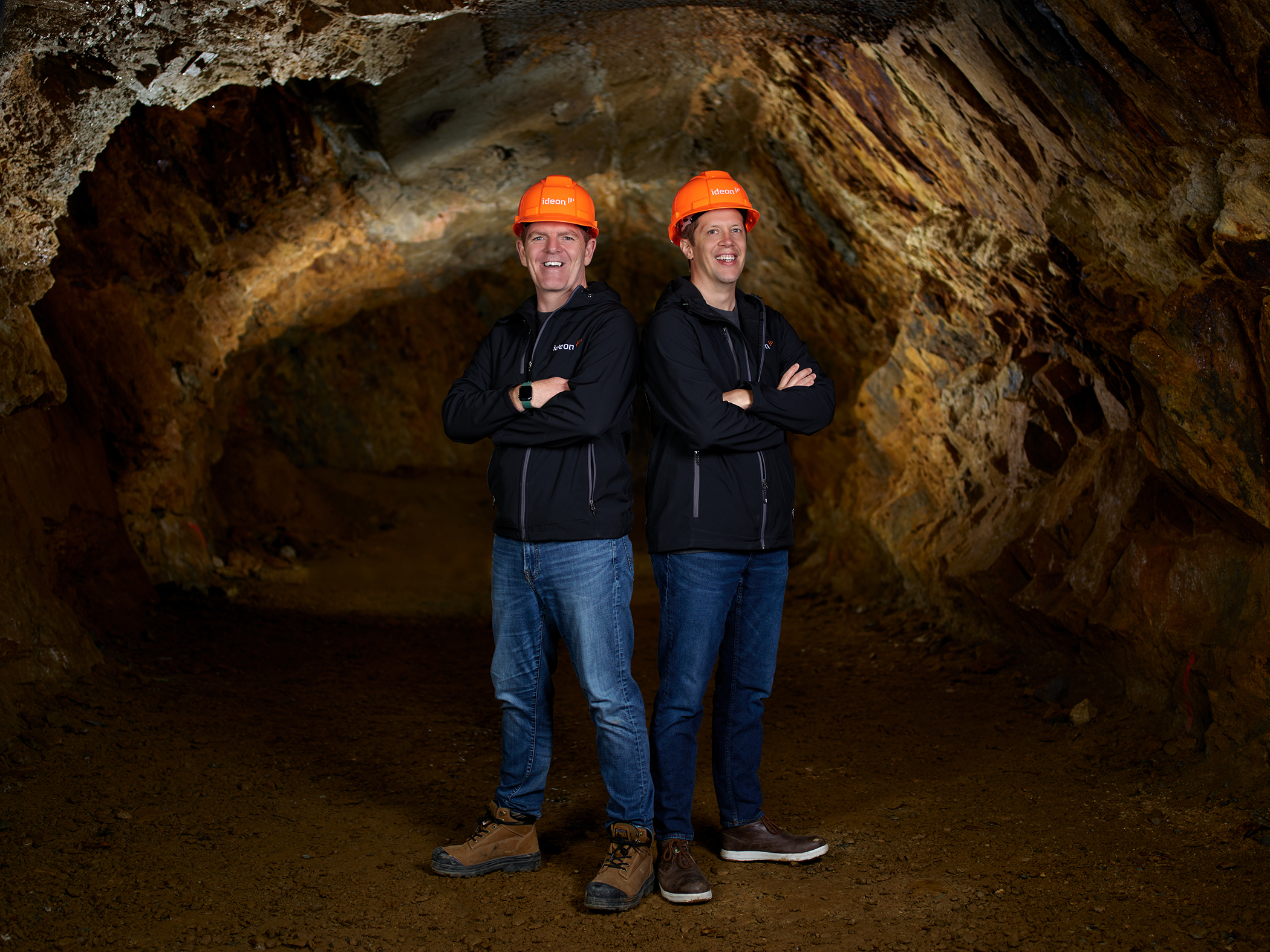 men with hard hats in a mine