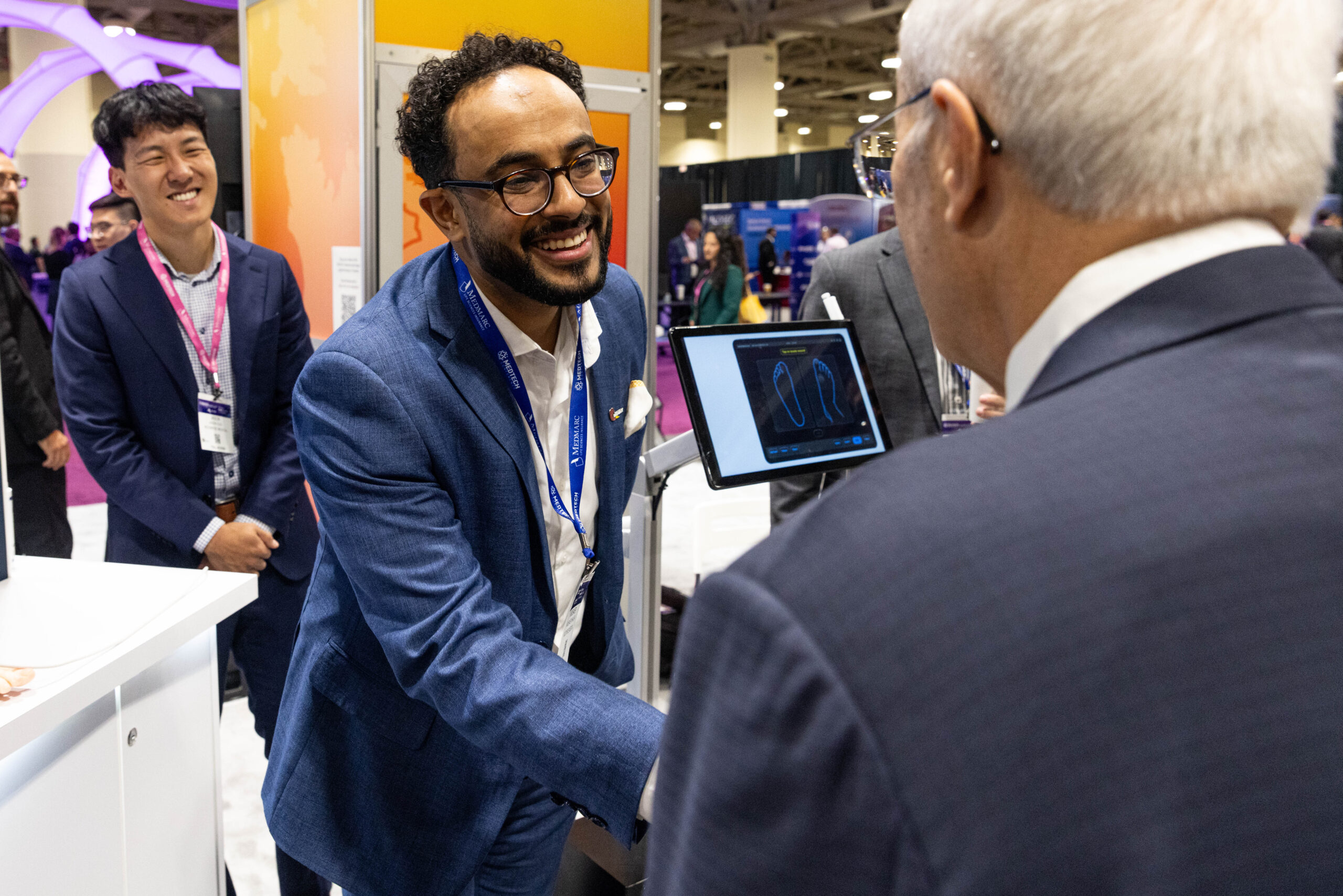 person handshaking other person